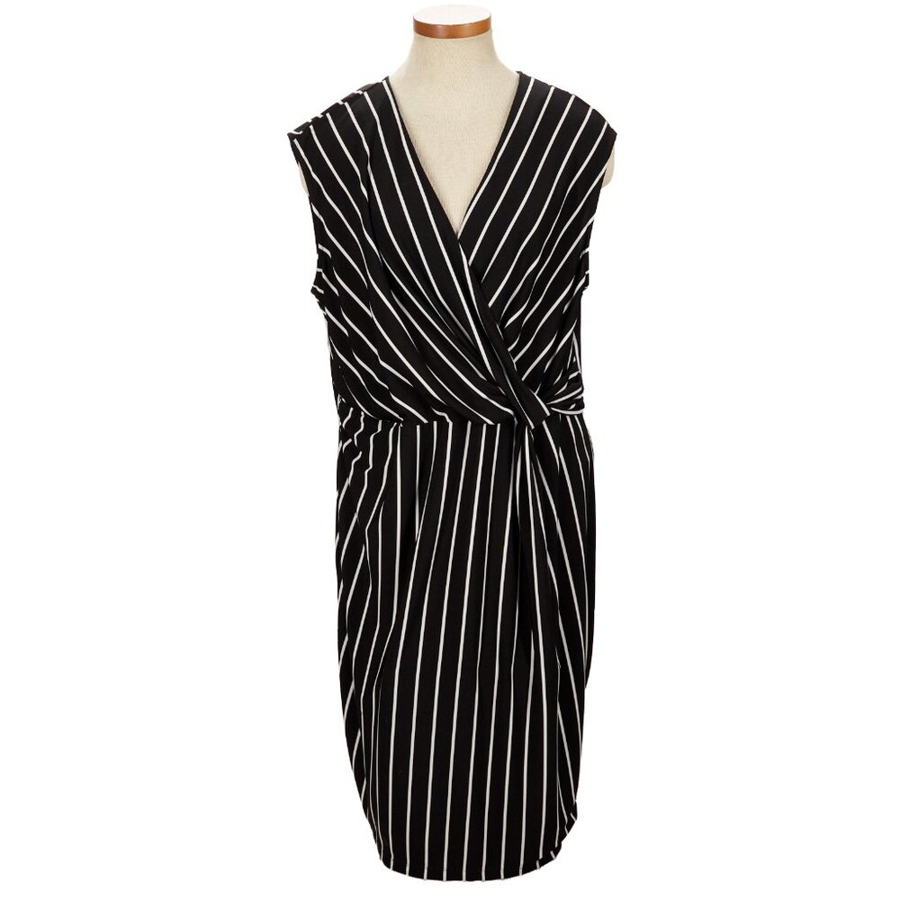 Be office ready in this comfortable plus-size faux wrap dress!